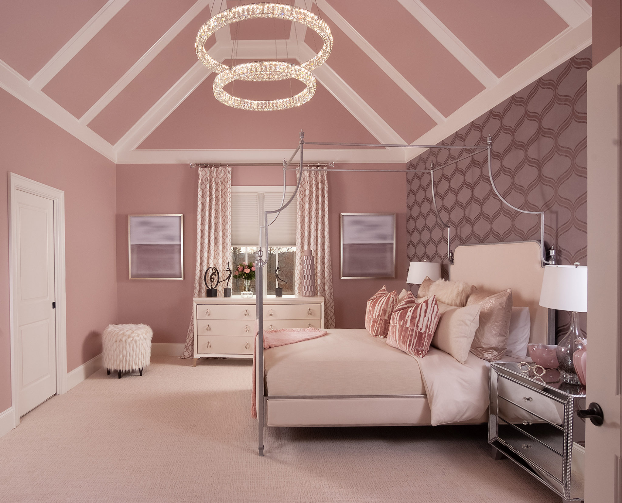 pink room with chandelier